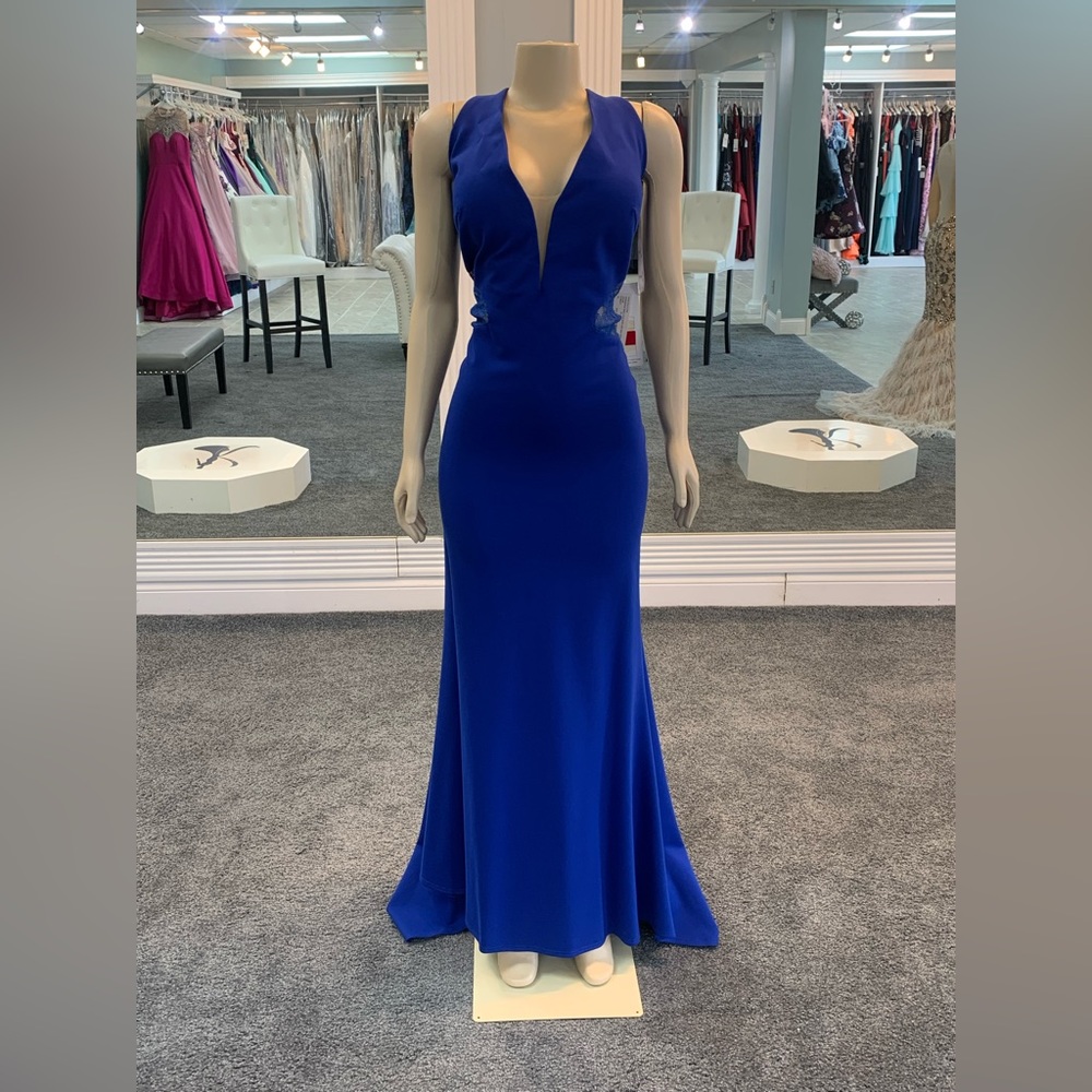 size 20. cobalt. bodycon trumpet. lace sides and back. button down design.